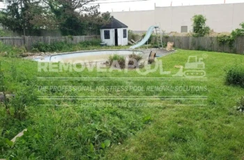 The backyard with an old pool before the removal process begins. An overgrown backyard in Bel Air, MD, with an old pool before the removal process begins.