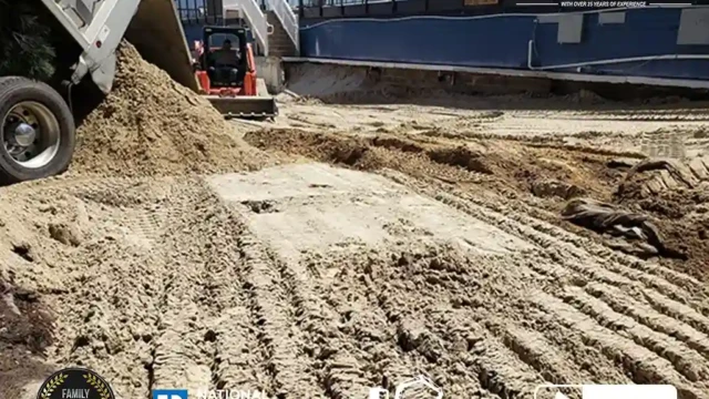 Graded soil dumped by a dump truck for backfilling