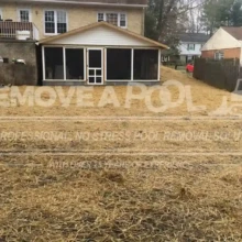 The site is fully restored, with the yard leveled and ready for future use after the pool removal. The site in Potomac, where a pool once stood, is fully restored and covered with straw for grass seeding. Pool removal was completed.