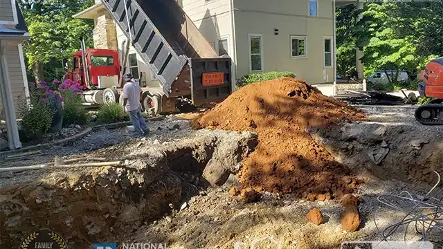 Step 12: Our dump truck started unloading the backfill. The dump truck unloaded the backfill.