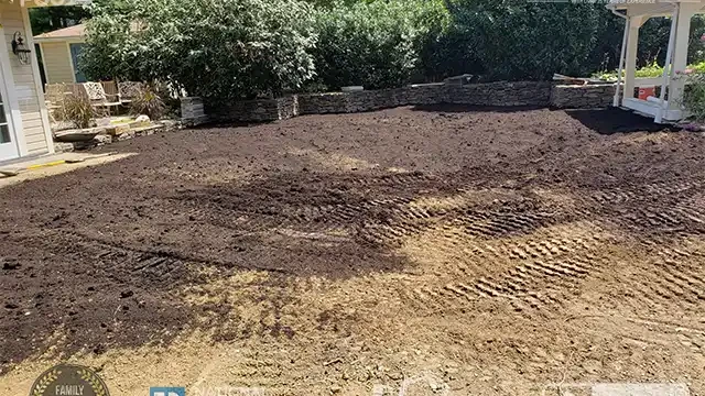 Step 18: We began spreading the graded soil for landscaping. Graded soil was spread for landscaping.