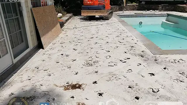 Step 3: While continuing to drain the pool, we proceeded with the deck removal process. We continued deck removal while draining the pool.