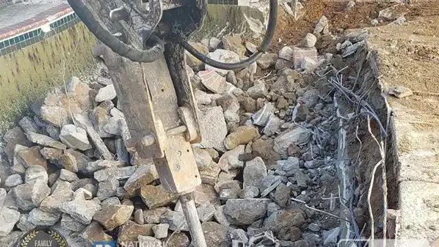 Step 10: The excavator then moves in to demolish the pool walls, systematically taking them down to prepare for filling. The excavator demolished the pool walls.