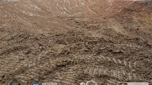 Step 19: The pool area is graded, and additional soil is added to begin the leveling process. The pool was graded, and soil was added to the site.