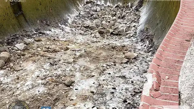 Step 6: Our team continues by breaking up the bottom of the pool, carefully working section by section to control the demolition process. We systematically broke the bottom part of the pool.