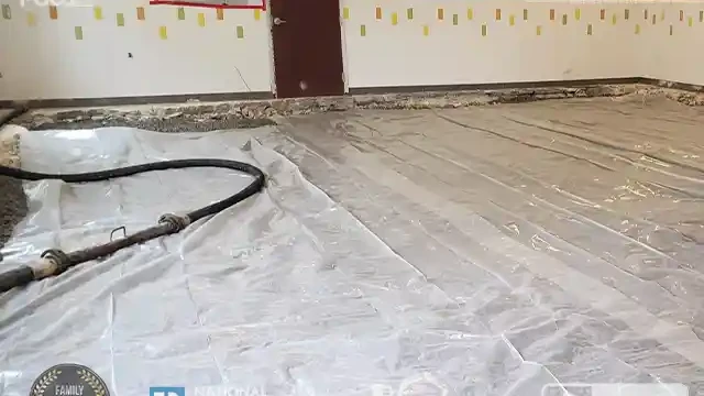 The first layer of concrete is leveled and graded. We cover it with plastic and make it ready for the next pouring