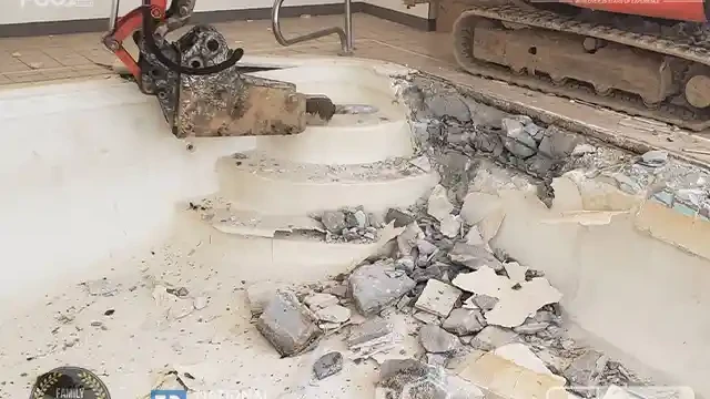 We start tearing the shell of the pool first